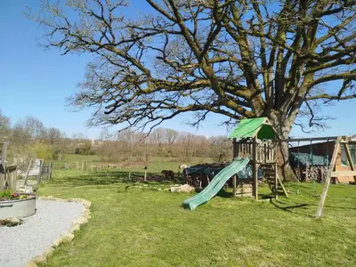 Aire de jeux pour enfants de l'établissement Maisonnette Familiale proche du PUYDUFOU