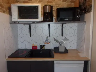 Cuisine ou kitchenette dans l'établissement appartement saint hilaire de riez 85270