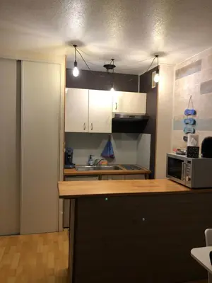 Cuisine ou kitchenette dans l'établissement Studio Bords de plage