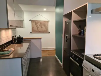 Cuisine ou kitchenette dans l'établissement L'Haussmannien