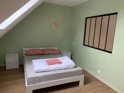 Un ou plusieurs lits dans un hébergement de l'établissement Appartement Hanami - Maulévrier Cholet Puy du Fou