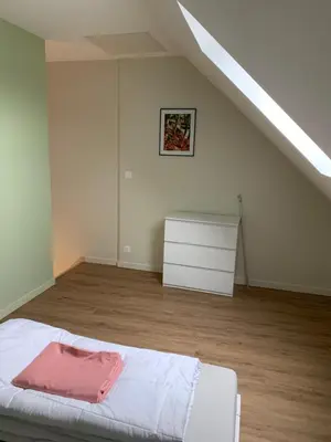 Un ou plusieurs lits dans un hébergement de l'établissement Appartement Hanami - Maulévrier Cholet Puy du Fou