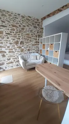Coin salon dans l'établissement Gîte le ST Aubinois