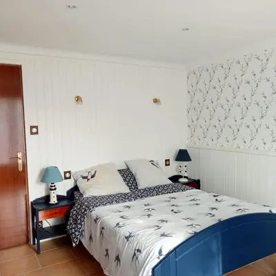 Un ou plusieurs lits dans un hébergement de l'établissement Maison La Belvérine