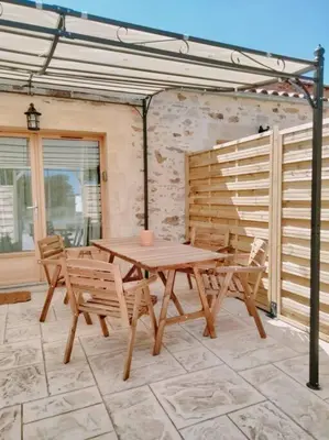 Balcon ou terrasse dans l'établissement Maisonnette de charme A 5 min du Parc PUYDUFOU