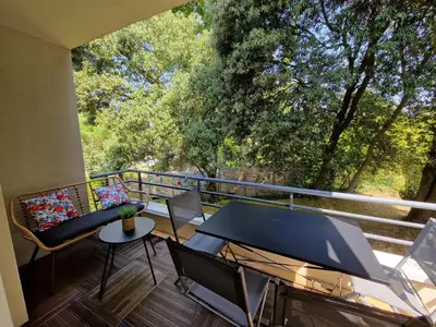 Balcon ou terrasse dans l'établissement Appartement Spacieux avec Parking proche MER