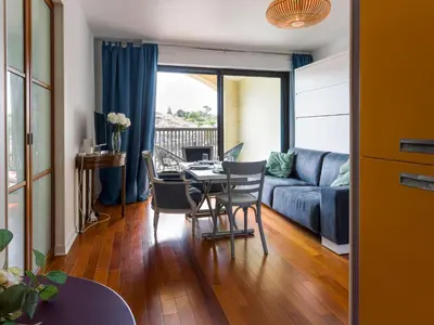 Coin salon dans l'établissement Apartment Le Continental by Interhome