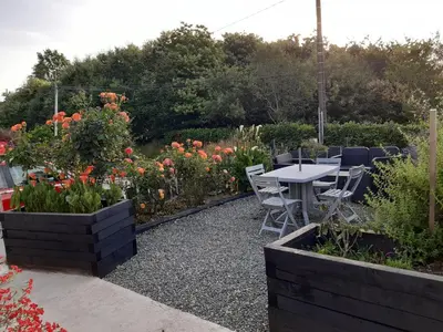 Jardin de l'établissement Location à Rieux, proche de Redon, parking, wifi