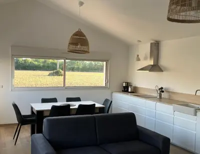 Cuisine ou kitchenette dans l'établissement L’Oasis
