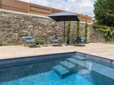 Piscine de l'établissement Le Clos de Jade - Appt 3 étoiles avec piscine partagée ou située à proximité