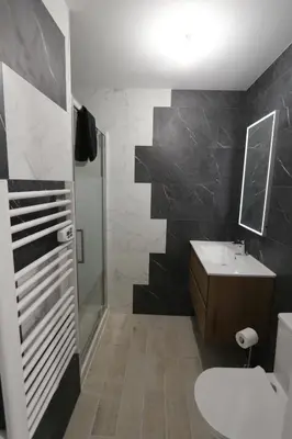 Salle de bains dans l'établissement Appart hotel Cholet Carteron