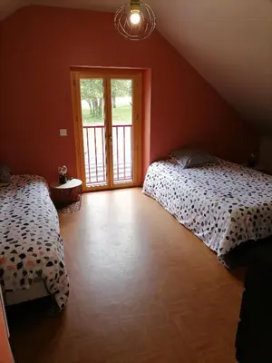Un ou plusieurs lits dans un hébergement de l'établissement Maison à la campagne 