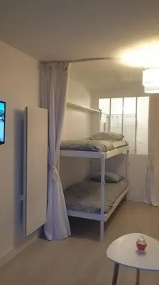 Un ou plusieurs lits dans un hébergement de l'établissement Le Front de Mer, superbe vue mer