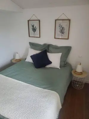 Un ou plusieurs lits dans un hébergement de l'établissement La Maison Du Puy