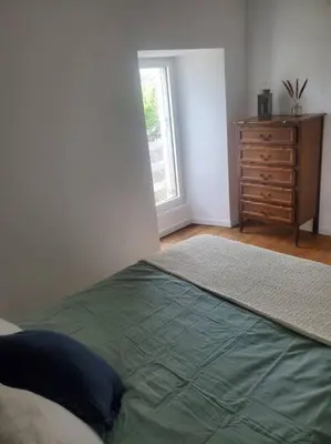 Un ou plusieurs lits dans un hébergement de l'établissement La Maison Du Puy