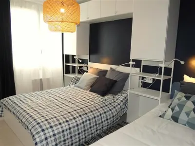 Un ou plusieurs lits dans un hébergement de l'établissement Superbe appartement moderne avec WiFi, proche plage et commerces - FR-1-323-280