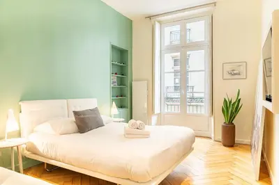 Un ou plusieurs lits dans un hébergement de l'établissement Le Crébillon - Splendide appartement de 204m2