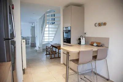Cuisine ou kitchenette dans l'établissement Maison de vacances bord de mer