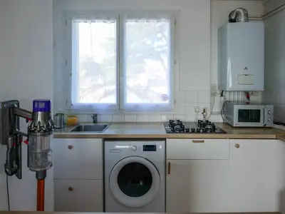 Cuisine ou kitchenette dans l'établissement Parenthèse nantaise, T2 chic et cosy, avec parking