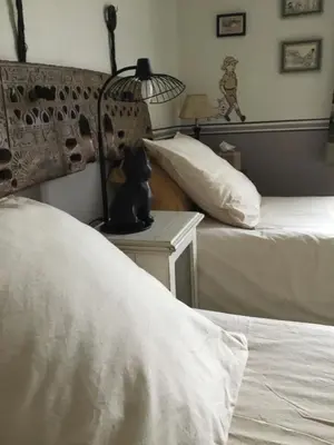 Un ou plusieurs lits dans un hébergement de l'établissement BnB Montacutain