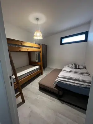 Un ou plusieurs lits dans un hébergement de l'établissement Villa Robinia Cormier 150 m de la plage