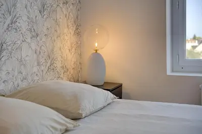 Un ou plusieurs lits dans un hébergement de l'établissement L'Espadon - Appart'Escale