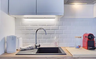 Cuisine ou kitchenette dans l'établissement L'Espadon - Appart'Escale
