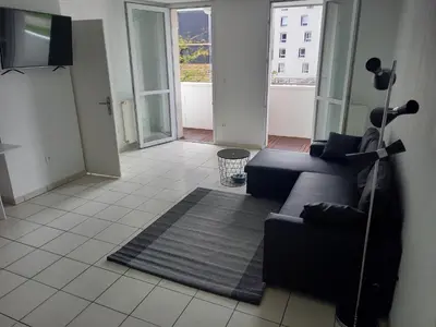 Télévision ou salle de divertissement dans l'établissement T2 St Nazaire Ouest