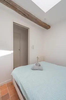 Un ou plusieurs lits dans un hébergement de l'établissement LE RELAIS DU ROY - Maison proche Cholet et Puy dufou