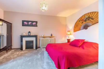 Un ou plusieurs lits dans un hébergement de l'établissement Chambre Nuit d'Asie