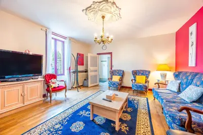 Télévision ou salle de divertissement dans l'établissement Chambre Rêve américain