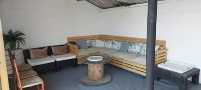 Coin salon dans l'établissement Le Logis de Laura