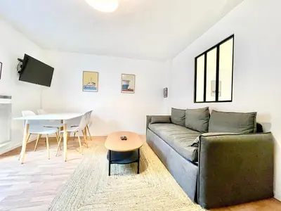Coin salon dans l'établissement Appartsaintnazaire - Saint Nazaire - 5 Appartements - Centre Ville