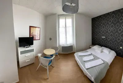 Un ou plusieurs lits dans un hébergement de l'établissement Hôtel de Nantes