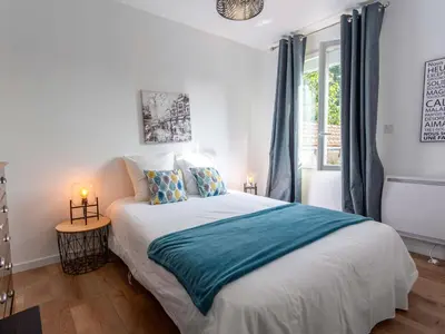 Un ou plusieurs lits dans un hébergement de l'établissement Holiday Home Le Bain du Papillon by Interhome