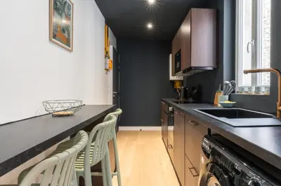 Cuisine ou kitchenette dans l'établissement Appartement élégant proche Tramway & Centre-Ville