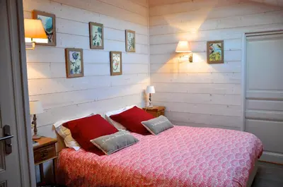 Un ou plusieurs lits dans un hébergement de l'établissement Chambre d'Hôtes La Maisonnette