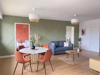 Coin salon dans l'établissement L'Échappée Belle - Appartement charmant et chaleureux