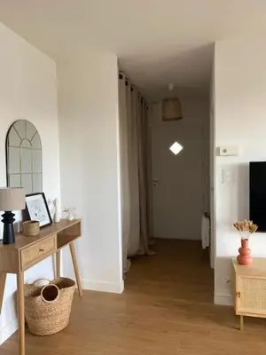 Télévision ou salle de divertissement dans l'établissement L'Échappée Belle - Appartement charmant et chaleureux