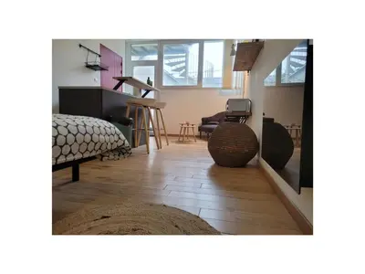 Coin salon dans l'établissement Le zen - Appartement avec terrasse