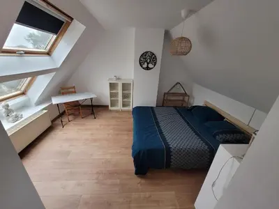 Un ou plusieurs lits dans un hébergement de l'établissement Le jardin de lumière -chambre2