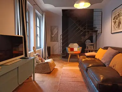 Télévision ou salle de divertissement dans l'établissement La Suite 14