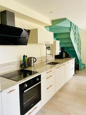 Cuisine ou kitchenette dans l'établissement Face Mer Villa Le Petit Breton