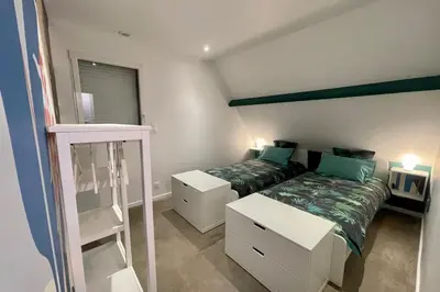 Un ou plusieurs lits dans un hébergement de l'établissement Loft dans chaumière pour 6 personnes à SaintAndré