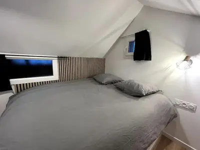 Un ou plusieurs lits dans un hébergement de l'établissement Studio 2 - Mi-Côte - Duplex à Orvault