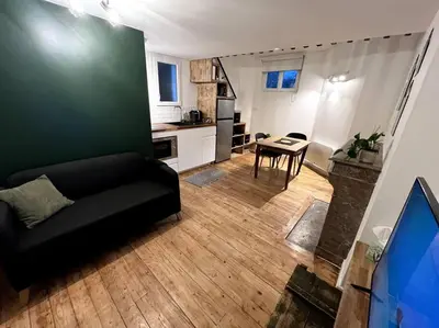 Coin salon dans l'établissement Studio 2 - Mi-Côte - Duplex à Orvault