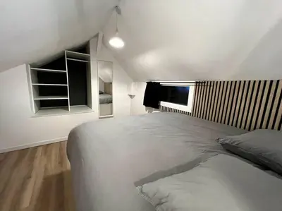 Un ou plusieurs lits dans un hébergement de l'établissement Studio 2 - Mi-Côte - Duplex à Orvault