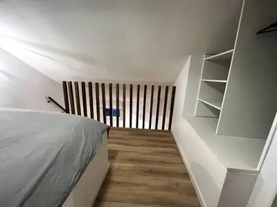 Un ou plusieurs lits dans un hébergement de l'établissement Studio 2 - Mi-Côte - Duplex à Orvault