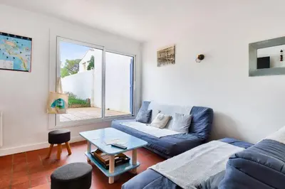 Coin salon dans l'établissement Instants de détente et de partage aux sables d'or