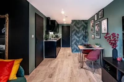 Cuisine ou kitchenette dans l'établissement L'Insoupçonnée